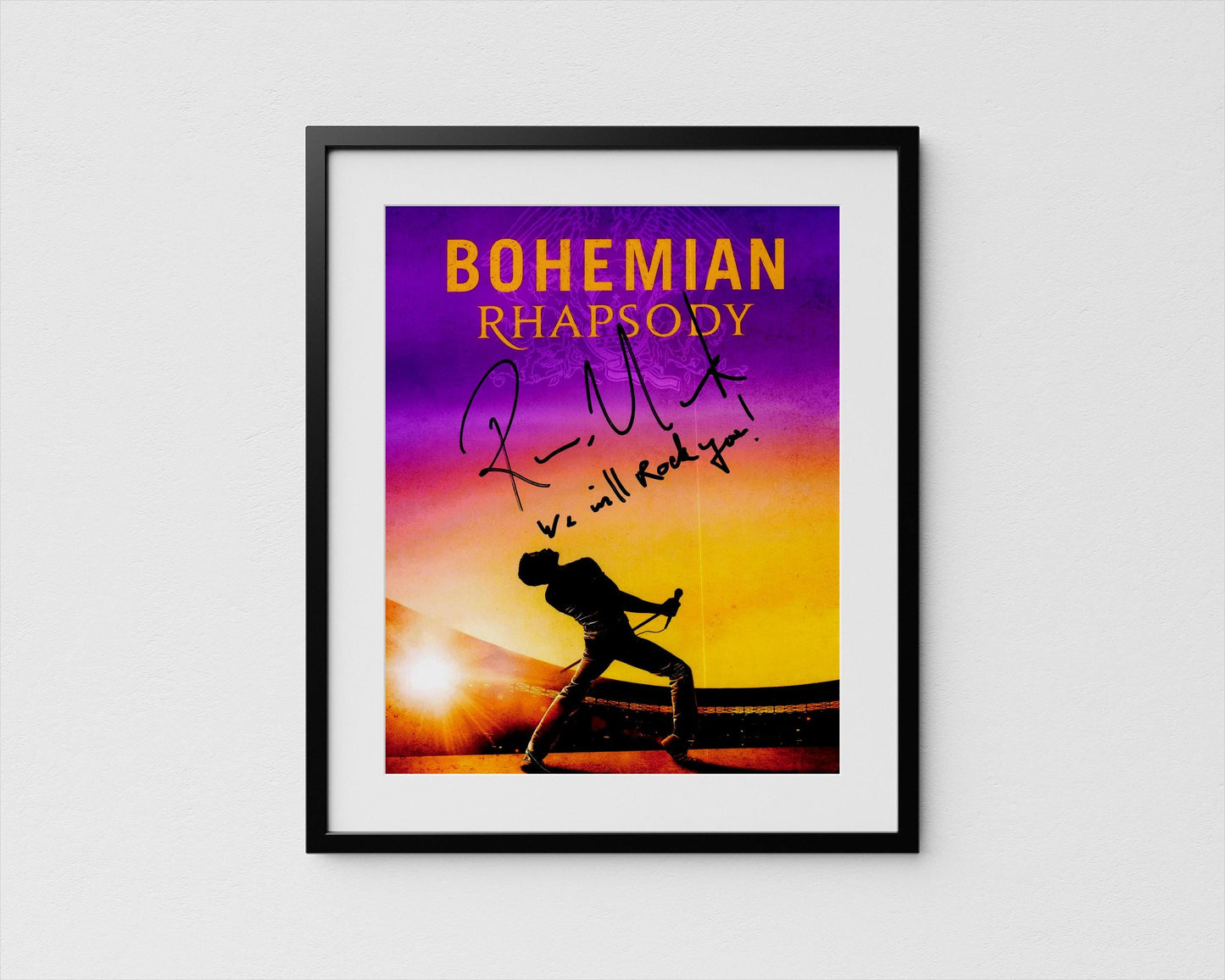 The image is a framed poster featuring a silhouette of a person playing the piano against a sunset background.