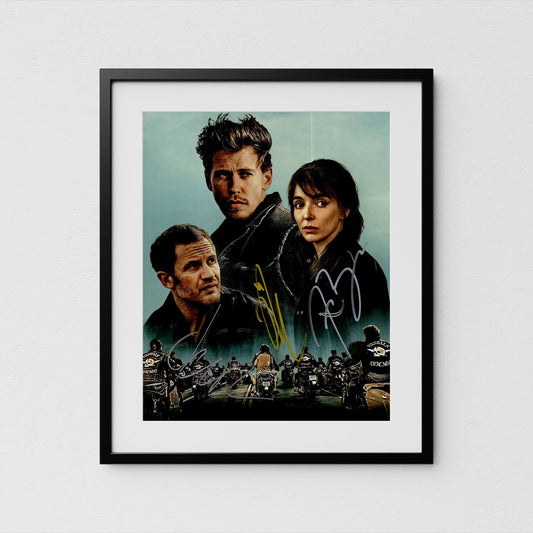 The image is a framed poster Bikeriders featuring Austin Butler. and Tom Hardy, likely with motorcycles in the background.