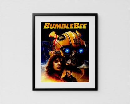 The image is a framed poster featuring the character Bumblebee from the Transformers movie franchise.