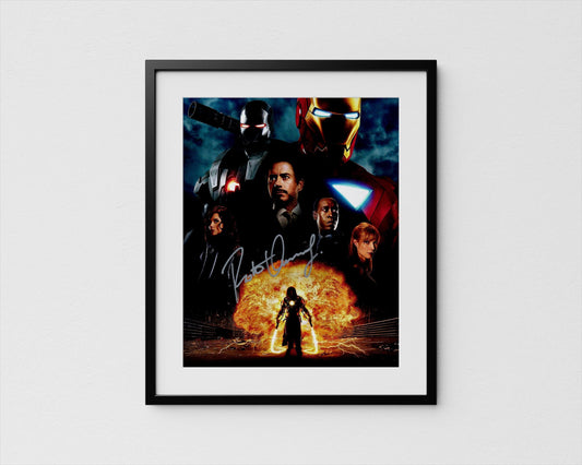 The image is a framed poster featuring various characters from a movie, including Iron Man, Captain America, and other superheroes.