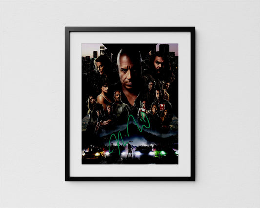The image is a framed poster featuring a collage of various characters from a movie or television show, with a dark and moody atmosphere.