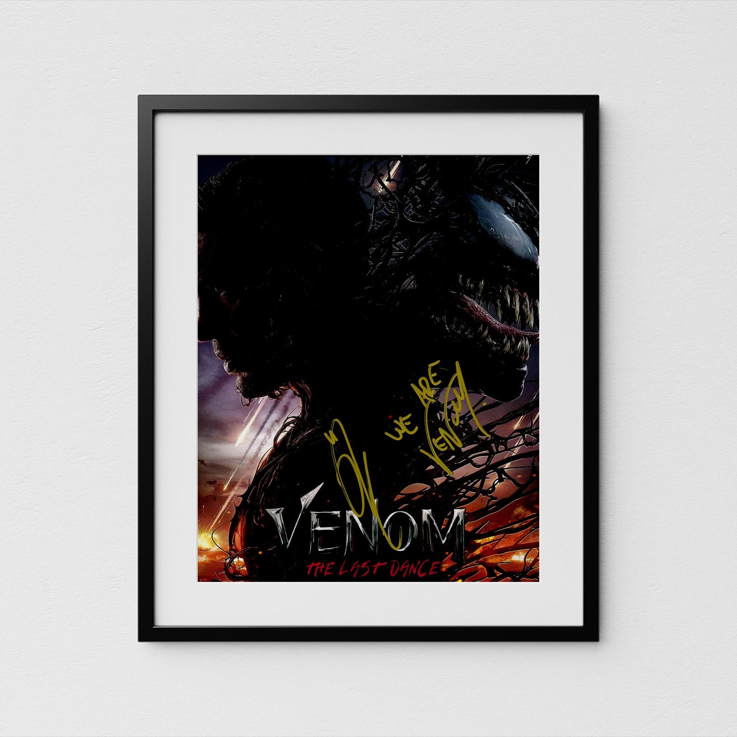 The image is a framed poster or artwork featuring a close-up of a dark, ominous creature with a large, menacing mouth, likely representing the character of the Marvel superhero, Venom.