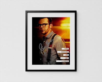 The image is a framed poster featuring a close-up portrait of a man wearing glasses and a gray shirt, with a text overlay that reads &quot;Some misses are not a choice&quot;.