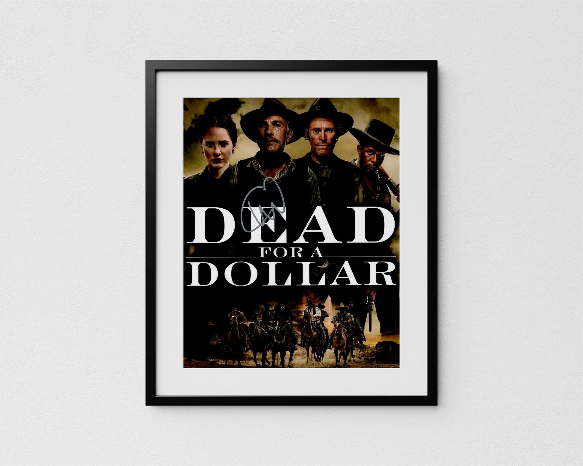 The image is a framed poster featuring the title &quot;Dead for a Dollar&quot; along with a group of people in cowboy hats and clothing, likely representing characters from a western film.